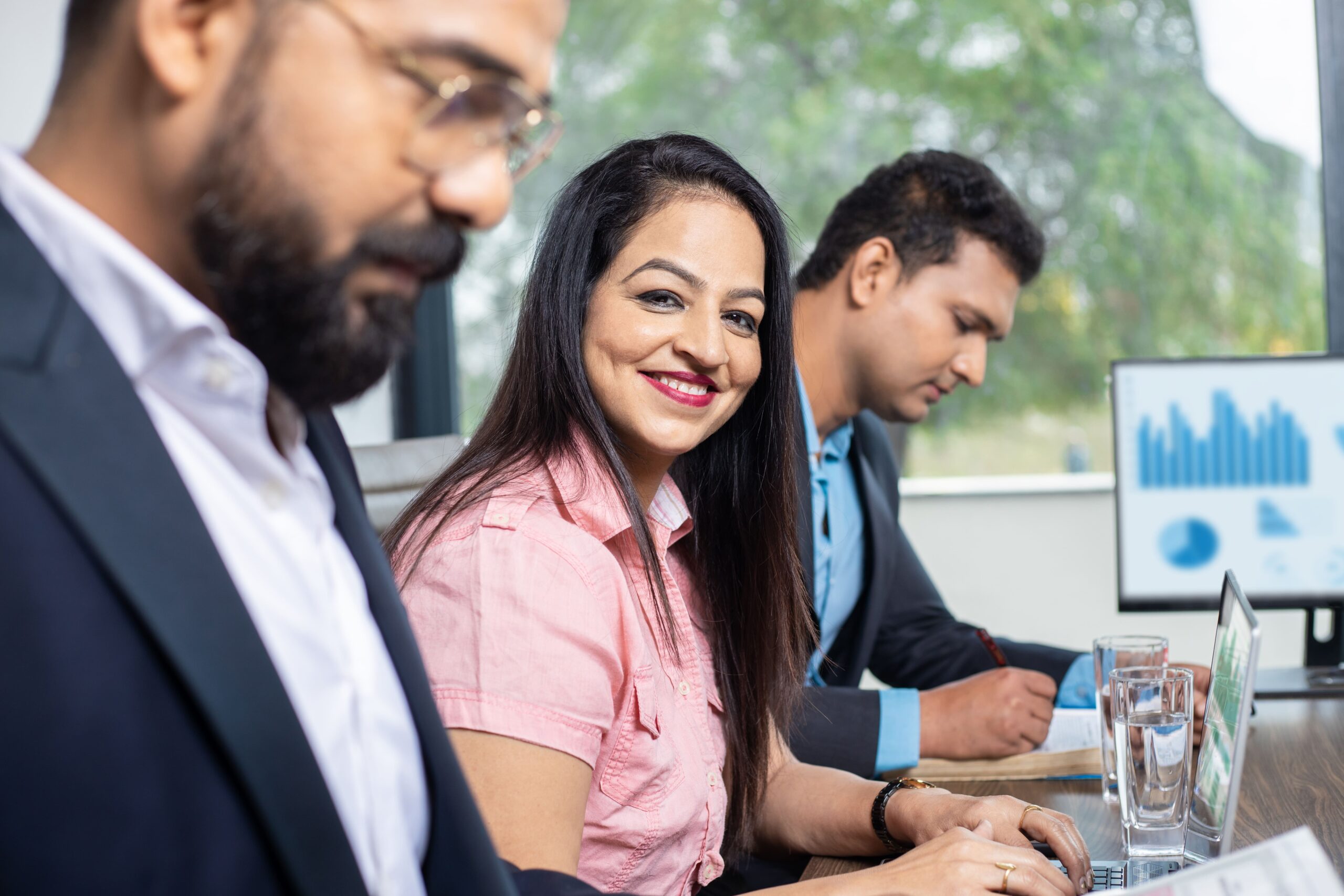 HR professionals collaborating on employee and workforce management